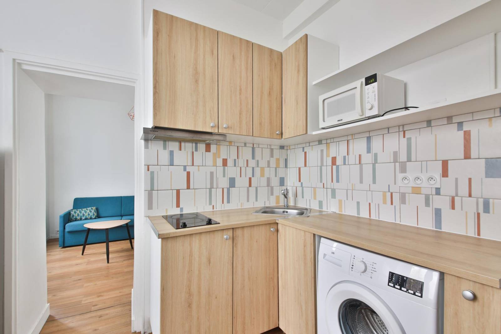 Cuisine fonctionnelle et optimisée dans un appartement 2 pièces du 14ème arrondissement 