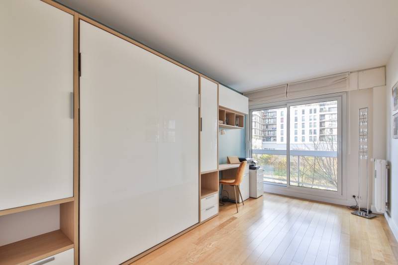 Espace nuit confortable dans une copropriété de standing