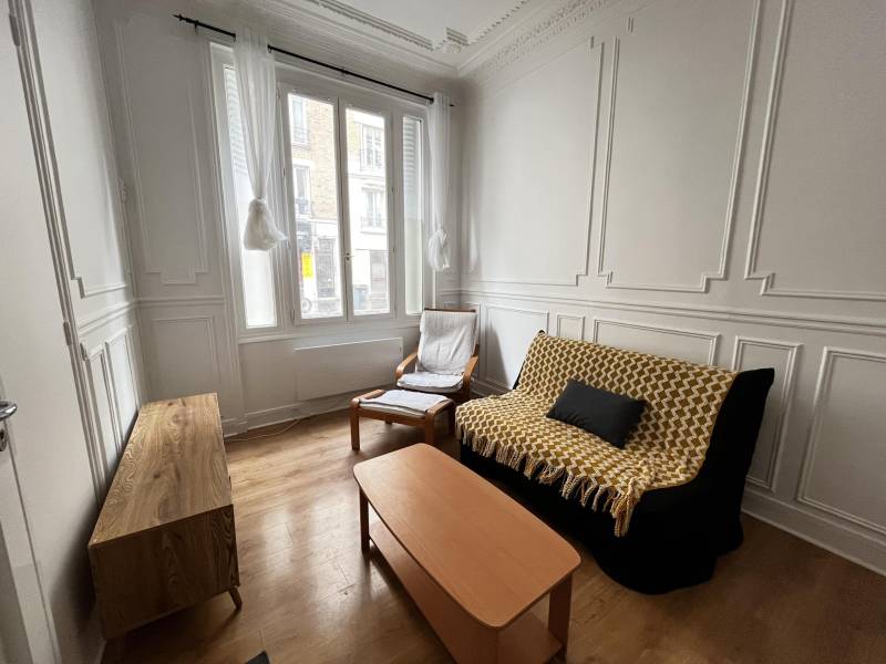 Pièce de vie lumineuse dans un appartement à louer Paris 15ème Boulevard de Grenelle