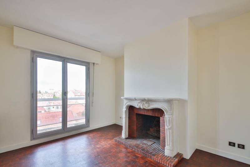 Pièce de vie chaleureuse et lumineuse au centre de Clamart 