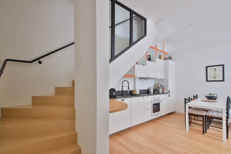 Espace cuisine moderne et fonctionnelle dans une maison familiale neuve à acheter à Paris proche métro Plaisance et commodités